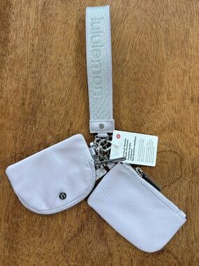 Lululemon dual pouch wristlet metallic wordmark